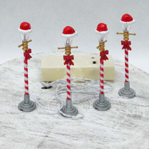Kép 2/2 - Ledes kandeláber 10cm 4db, mikulássapkában